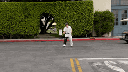 Man Crashed By Gold Cart GIF