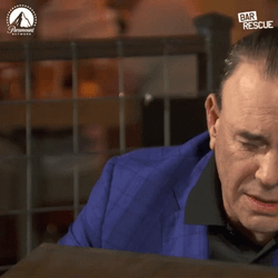 Man Cries And Bang Head On Desk GIF