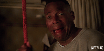 Man Crying Holding Red Rope Netflix GIF