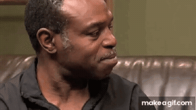 Man Crying On Couch Making Funny Face GIF