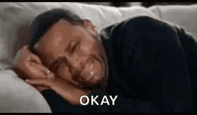Man Crying On Couch Saying Okay GIF