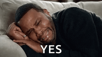 Man Crying On Couch With Yes On Face GIF