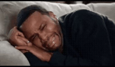 Man Crying On Couch GIF