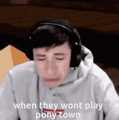 Man Crying Playing Video Game With Headphones GIF