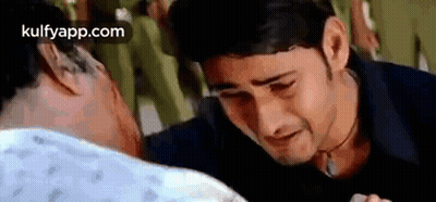 Man Crying While Another Man Looks On GIF