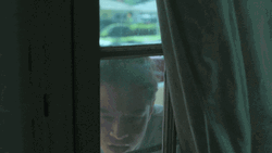 Man Curiously Looking Inside GIF