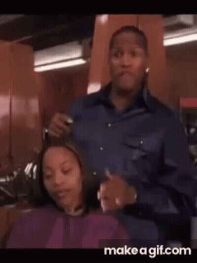 Man Cutting Woman's Hair In Salon GIF
