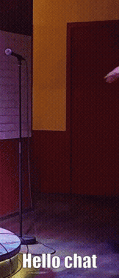 Man Dancing At Microphone Saying Hello Chat GIF