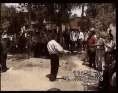 Man Dancing Before Crowd June 24 2003 GIF