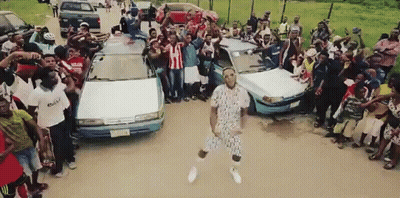 Man Dancing In Crowd, Another In Adidas Shirt GIF