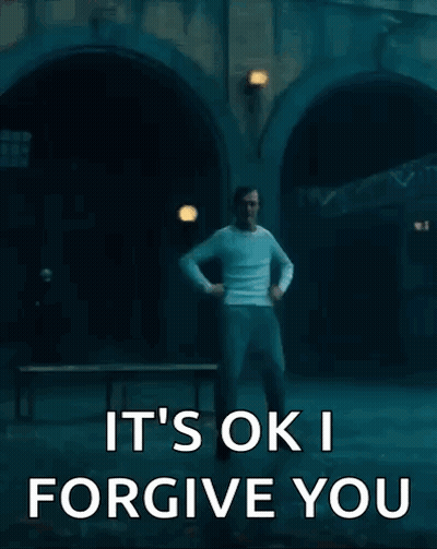 Man Dancing In Dark Room Saying It's Ok I Forgive You GIF