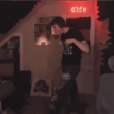Man Dancing In Front Of @ 3Fs Sign GIF