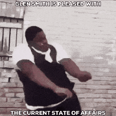 Man Dancing In Front Of Brick Wall GIF