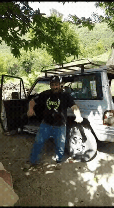 Man Dancing In Front Of Car GIF