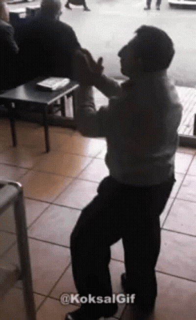 Man Dancing in Front of Crowd