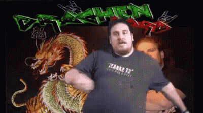 Man Dancing In Front Of Dragon And Death Sign GIF