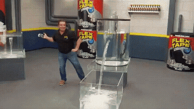 Man Dancing In Front Of Flex Tape Containers GIF