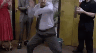 Man Dancing In Front Of Group GIF