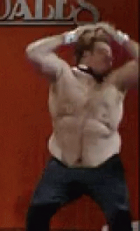 Man Dancing In Front Of Jalisco Sign GIF