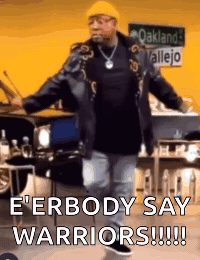 Man Dancing In Front Of Oakland Valley Sign GIF