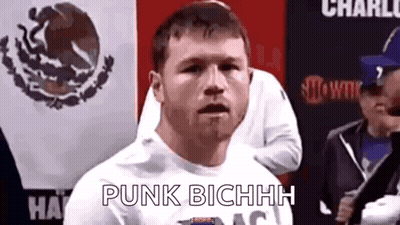 Man Dancing In Front Of Red Brick Wall Saying Come At Me Bro GIF