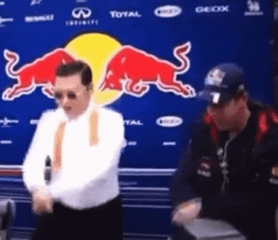 Man Dancing In Front Of Red Bull Advertisement GIF
