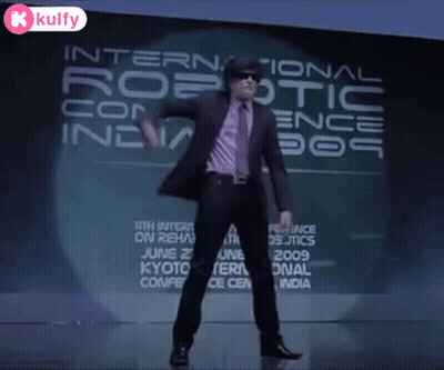 Man Dancing In Front Of Robotic Conference Sign GIF
