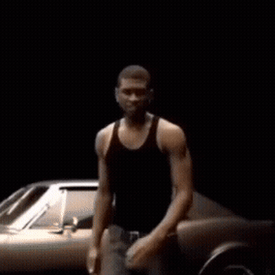 Man Dancing In Front Of Silver Car GIF