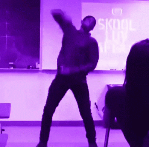 Man Dancing In Front Of Skool Love Sign GIF