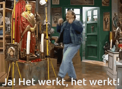 Man Dancing In Front Of Statue Saying Het Werkt Het Werkt GIF