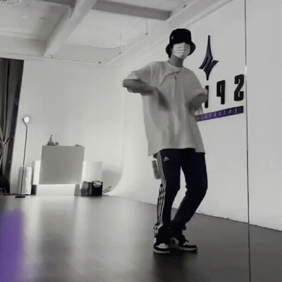 Man Dancing In Front Of Wall Number 142 GIF