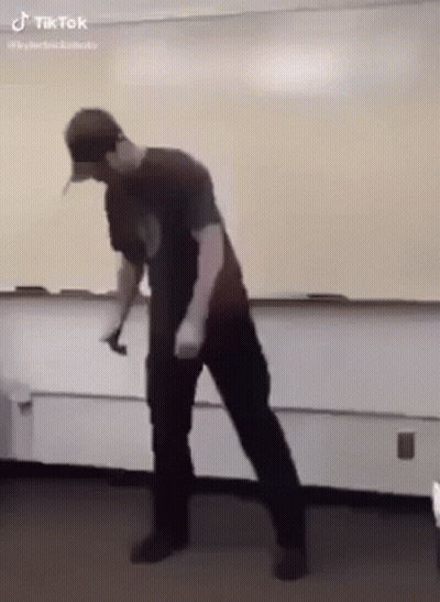 Man Dancing In Front Of Whiteboard GIF