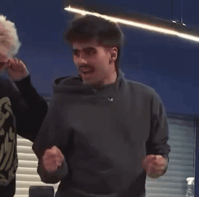 Man Dancing In Gray Sweater GIF