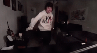 Man Dancing In Living Room Wearing Cool Hat Sweater GIF