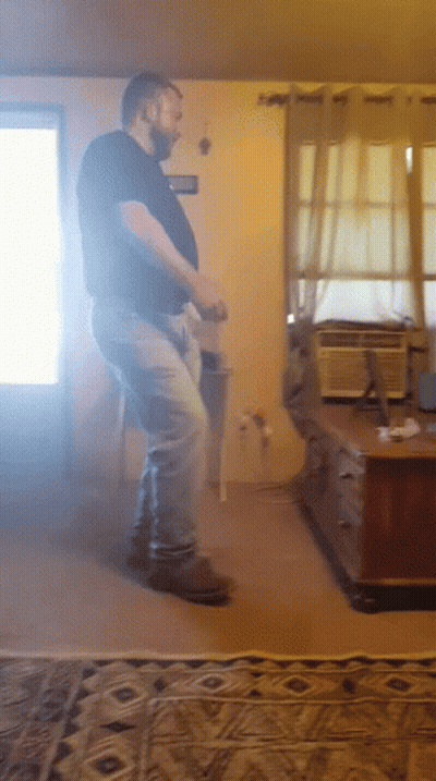 Man Dancing In Living Room With Air Conditioner GIF