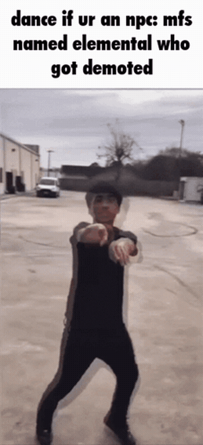 Man Dancing In Parking Lot In Front Of Building GIF