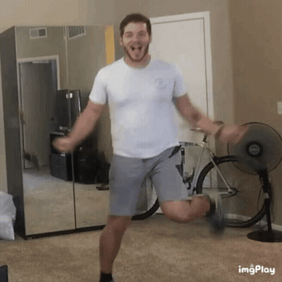 Man Dancing In Room With Fan And Bicycle GIF