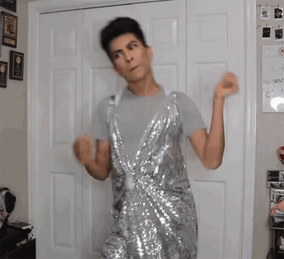 Man Dancing In Silver Sequin Dress GIF