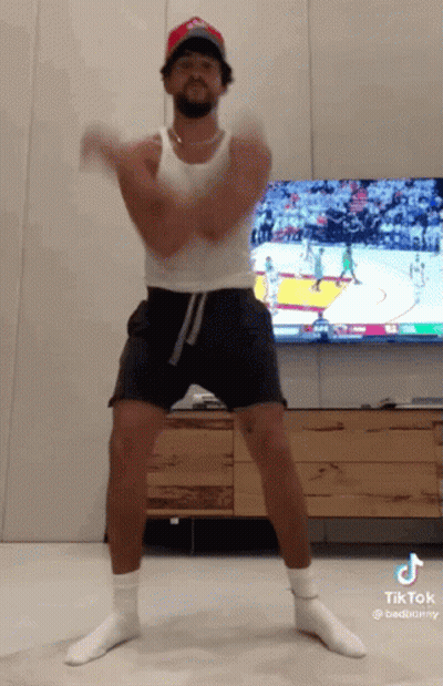 Man Dancing In Tank Top And Shorts GIF
