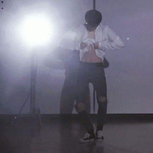 Man Dancing In White Shirt And Black Jeans GIF