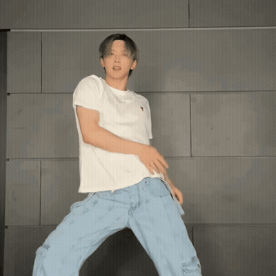 Man Dancing In White T-Shirt And Blue Jeans GIF