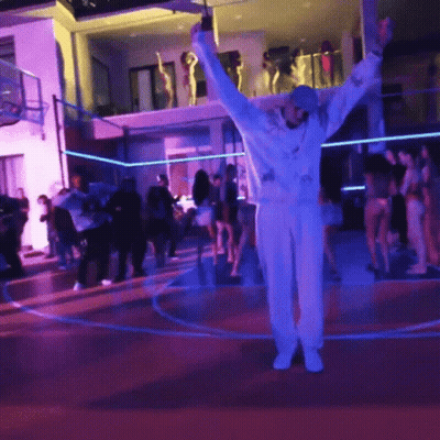 Man Dancing On Basketball Court With Crowd GIF