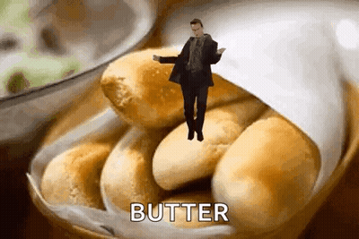 Man Dancing On Bowl Of Rolls With Butter GIF
