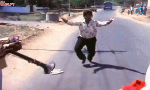 Man Dancing On Road Beside Loudspeaker GIF