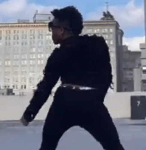 Man Dancing On Rooftop GIF