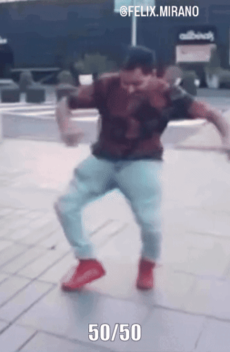 Man Dancing On Sidewalk With 50/50 Below GIF