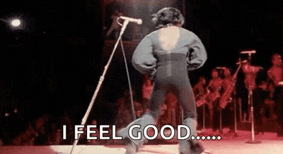 Man Dancing On Stage At Microphone With Crowd GIF