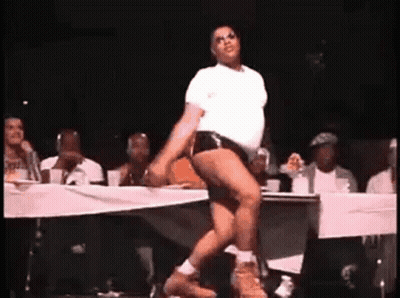 Man Dancing On Stage In Front Of Crowd GIF