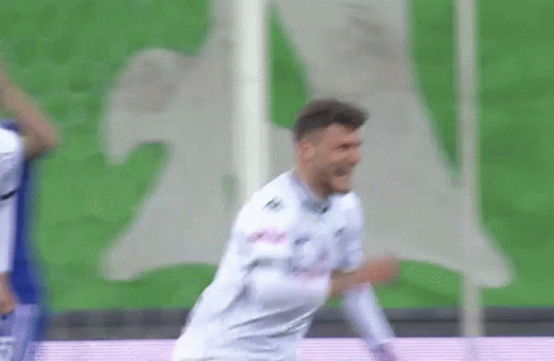 Man Dancing On Stage Near Red Wall GIF