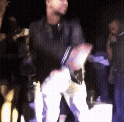 Man Dancing On Stage With Microphone GIF